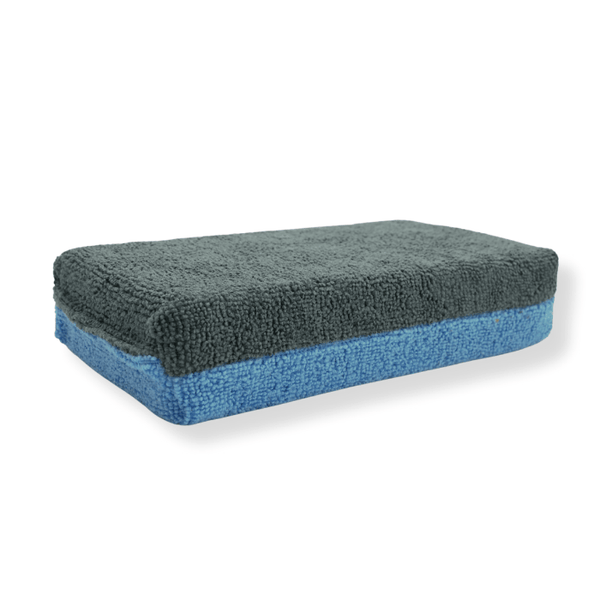 Rectangular extra large no soak microfibre applicator on a white background