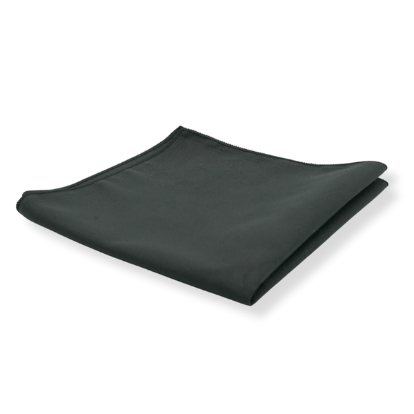 A black suede cloth folded on a white background