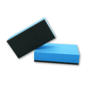 A stack of 2 premium blue ceramic coating applicators on a white background