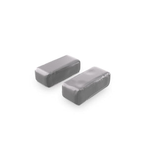 A box of grey hard clay bars in a grey colour