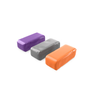 A purple, grey and orange clay bars on a white background