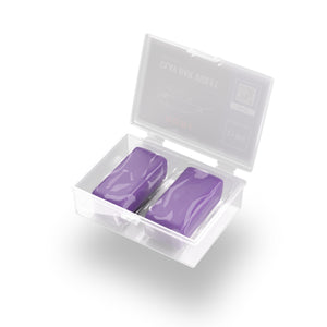 A box with two purple clay bars on a white background