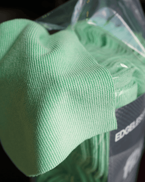 A close up shot of a green pearl knit microfibre cloth