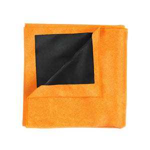 A orange clay towel on a white background 
