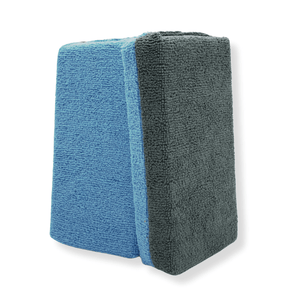 Two extra large no soak microfibre applicators on a white background