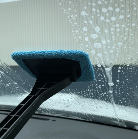 Car Windscreen Cleaning Tool in use
